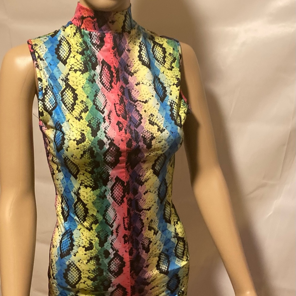 Multicolored one piece . Size medium but fits really tight more like a small